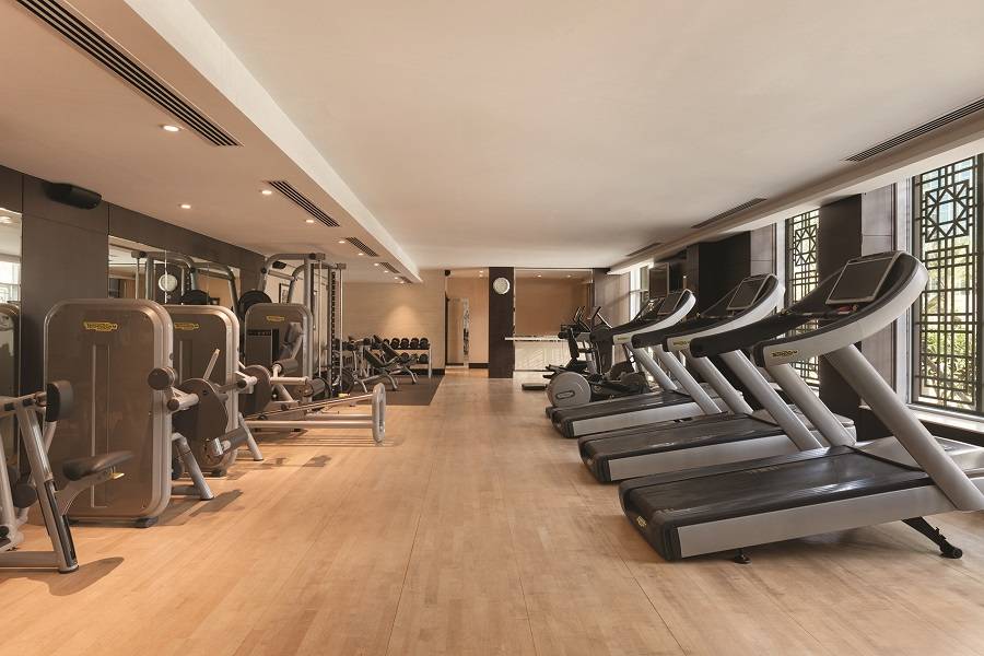 {"id":4,"facility_id":3,"lang_id":1,"hotel_id":201000001,"name":"Gym and Badminton","slug":"gym-and-badminton","description":"<p>The fully equipped gymnasium is complete with top-grade fitness equipment with a steam room and is available to guests who wish to stay fit and active during their stay.<\/p>\r\n\r\n<p>For guests who enjoy this all-time favorite summer sport, a badminton court is available for use during their stay.<\/p>\r\n\r\n<p>[break]<\/p>\r\n\r\n<table class=\"table table-dark table-striped table-bordered\">\r\n\t<thead>\r\n\t\t<tr>\r\n\t\t\t<th>Facility<\/th>\r\n\t\t\t<th>Timing<\/th>\r\n\t\t<\/tr>\r\n\t<\/thead>\r\n\t<tbody>\r\n\t\t<tr>\r\n\t\t\t<td>Gym<\/td>\r\n\t\t\t<td>From 7:00 am to 10:00 pm<\/td>\r\n\t\t<\/tr>\r\n\t\t<tr>\r\n\t\t\t<td>Badminton<\/td>\r\n\t\t\t<td>available upon request<\/td>\r\n\t\t<\/tr>\r\n\t<\/tbody>\r\n<\/table>\r\n\r\n<div id=\"selection_bubble\" style=\"position:absolute;\tvisibility:hidden; padding:15px; color:#333; background-color: white; border: 5px solid black; border-radius:10px; width:300px; z-index:10000\">&nbsp;<\/div>\r\n\r\n<div id=\"selection_bubble\" style=\"position:absolute;\tvisibility:hidden; padding:15px; color:#333; background-color: white; border: 5px solid black; border-radius:10px; width:300px; z-index:10000\">&nbsp;<\/div>","sort":2,"status":1,"created_at":"2019-10-30 06:48:13","updated_at":"2019-12-18 15:28:15","deleted_at":null,"image_slider":{"id":1412,"lang_id":1,"image_sliderable_id":4,"image_sliderable_type":"App\\HotelFacility","image_slider":"uploads\/image-slider\/51207b1c17deeb868f32e3805316e2a01579611230.jpg","name":null,"sub_name":null,"content":null,"status":1,"created_at":"2020-01-21 12:53:50","updated_at":"2020-01-21 12:53:56","sort":1,"is_mobile":0}}-slider