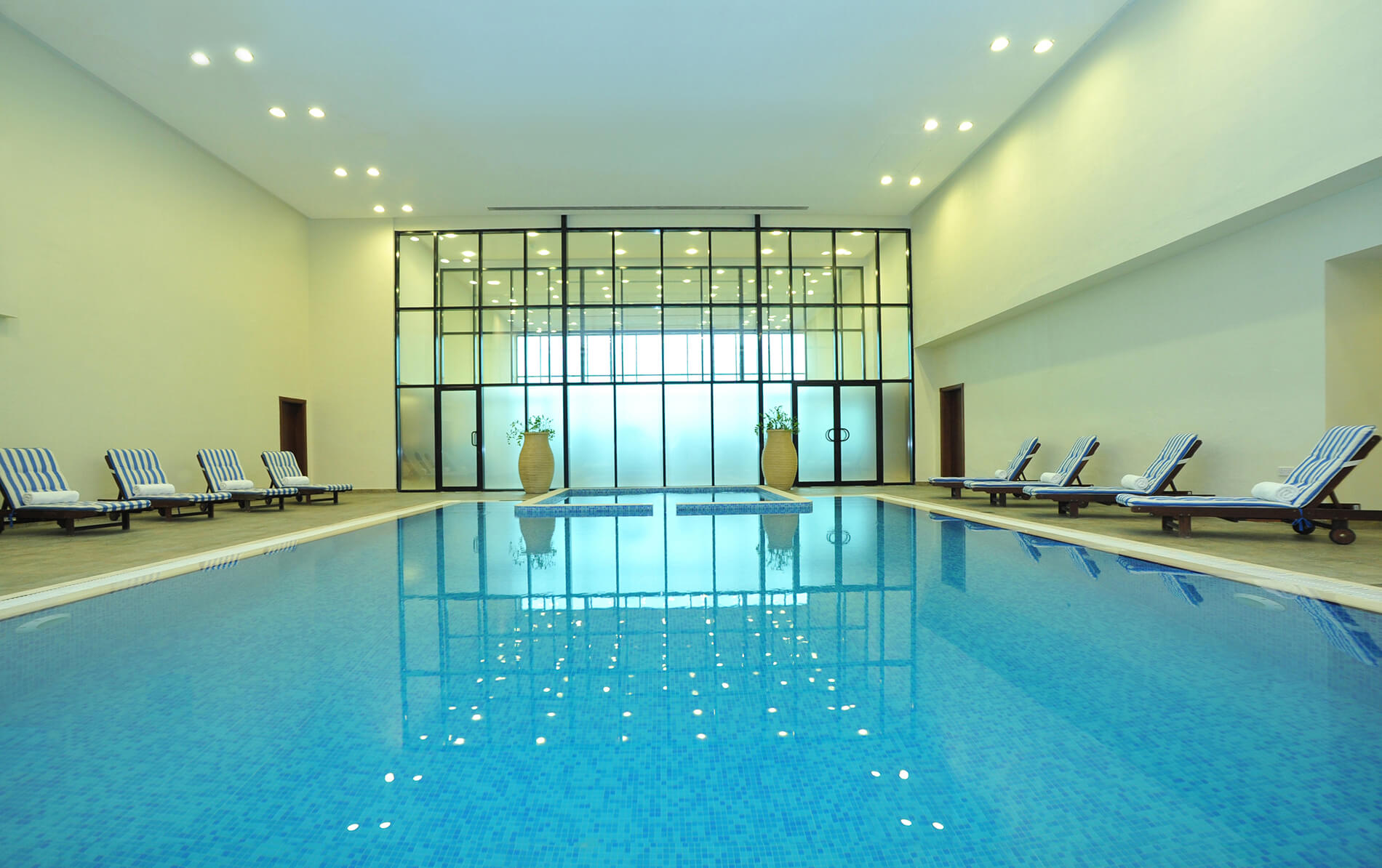 {"id":12,"facility_id":11,"lang_id":1,"hotel_id":201000004,"name":"Indoor Swimming Pool","slug":"indoor-swimming-pool","description":"<p>Whether you want to cool down and ease those aching muscles after a workout or simply take a relaxing swim, take a dip in the temperature-controlled indoor swimming pool. What&rsquo;s more, with a separate a kid&rsquo;s pool, this is the perfect place for the whole family to enjoy a fun escape from the heat of the day.<\/p>\r\n\r\n<p>Ramada Hotel &amp; Suites by Wyndham Ajman offers. It also offers swimming lessons for kids to provide your children with the confidence and freedom to enjoy swimming and water-based recreation, under the supervision of a professional swimming instructor.<\/p>\r\n\r\n<p>[break]<\/p>\r\n\r\n<table class=\"table table-dark table-striped table-bordered\">\r\n\t<thead>\r\n\t\t<tr>\r\n\t\t\t<th>Facility<\/th>\r\n\t\t\t<th>Timing<\/th>\r\n\t\t<\/tr>\r\n\t<\/thead>\r\n\t<tbody>\r\n\t\t<tr>\r\n\t\t\t<td>Indoor Swimming Pool<\/td>\r\n\t\t\t<td>From 07:00 am to 11:00 pm<\/td>\r\n\t\t<\/tr>\r\n\t<\/tbody>\r\n<\/table>\r\n\r\n<div id=\"selection_bubble\" style=\"position:absolute;\tvisibility:hidden; padding:15px; color:#333; background-color: white; border: 5px solid black; border-radius:10px; width:300px; z-index:10000\">&nbsp;<\/div>\r\n\r\n<div id=\"selection_bubble\" style=\"position:absolute;\tvisibility:hidden; padding:15px; color:#333; background-color: white; border: 5px solid black; border-radius:10px; width:300px; z-index:10000\">&nbsp;<\/div>\r\n\r\n<div id=\"selection_bubble\" style=\"position:absolute;\tvisibility:hidden; padding:15px; color:#333; background-color: white; border: 5px solid black; border-radius:10px; width:300px; z-index:10000\">&nbsp;<\/div>","sort":3,"status":1,"created_at":"2019-10-30T07:41:00.000000Z","updated_at":"2019-12-17T11:05:03.000000Z","deleted_at":null,"image_slider":{"id":1227,"lang_id":1,"image_sliderable_id":12,"image_sliderable_type":"App\\HotelFacility","image_slider":"uploads\/image-slider\/1eecd0c1f72758c97043853ec93f2ac01574061457.jpg","name":null,"sub_name":null,"content":null,"status":1,"created_at":"2019-11-18T07:17:37.000000Z","updated_at":"2019-11-18T07:17:37.000000Z","sort":null,"is_mobile":0}}-slider