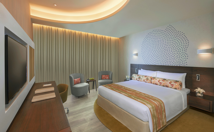 غرفة كلاسيكية بسرير من النوع كينج أو سرير مزدوج ملحق بها شرفة بإطلالة على جزيرة النخلة-slider-2