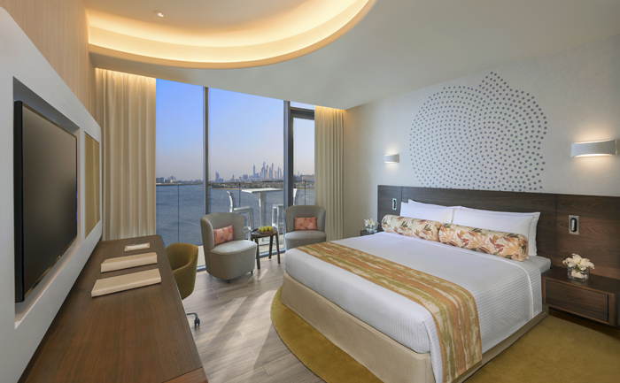 غرفة كلاسيكية بسرير من النوع كينج أو سرير مزدوج ملحق بها شرفة بإطلالة على جزيرة النخلة-room